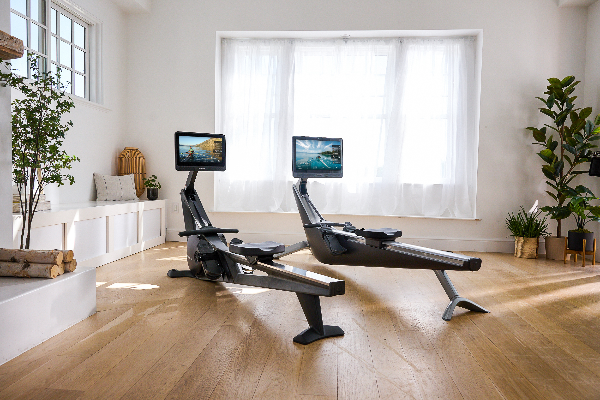 Hydrow Wave Rower (left) and Hydrow Origin Rower (right) side by side